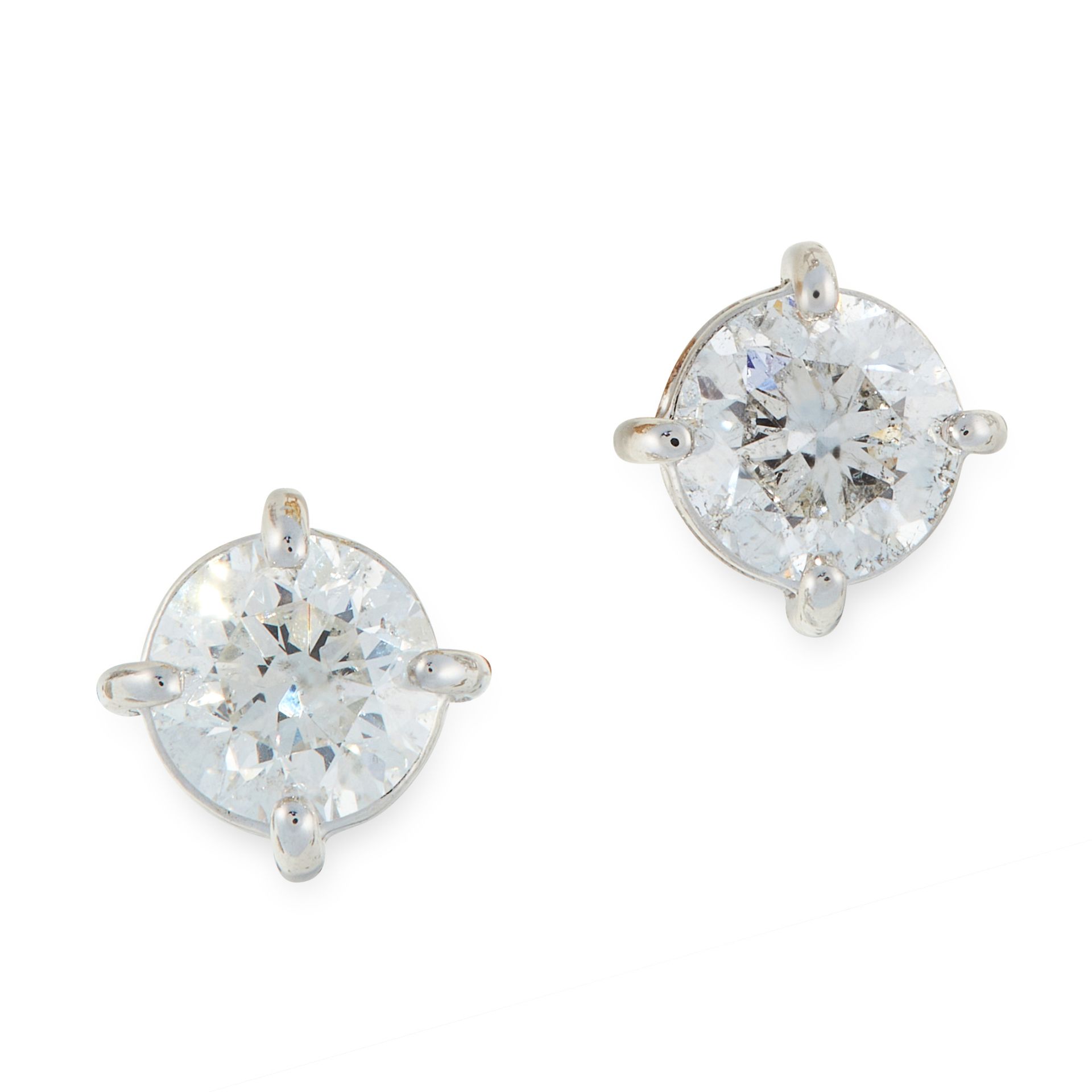 A PAIR OF DIAMOND STUD EARRINGS in 18ct white gold, set with a round cut diamond totalling 1.41
