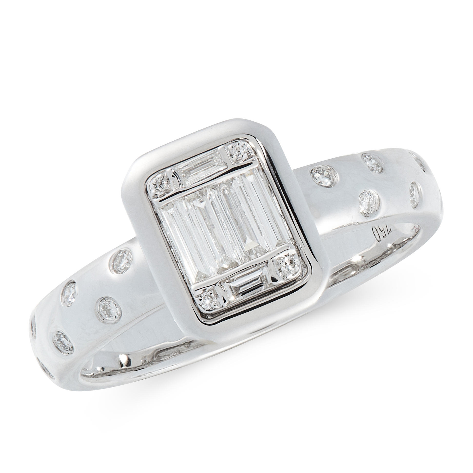 A DIAMOND DRESS RING in 18ct white gold, comprising of a band set with staggered round cut diamonds,