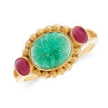 A MUGHAL CARVED EMERALD AND RUBY DRESS RING in 18ct yellow gold, set with an oval cabochon emerald