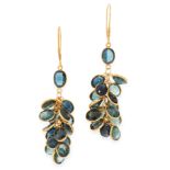 A PAIR OF SAPPHIRE CLUSTER EARRINGS in yellow gold, each set with an oval cut sapphire, suspending a