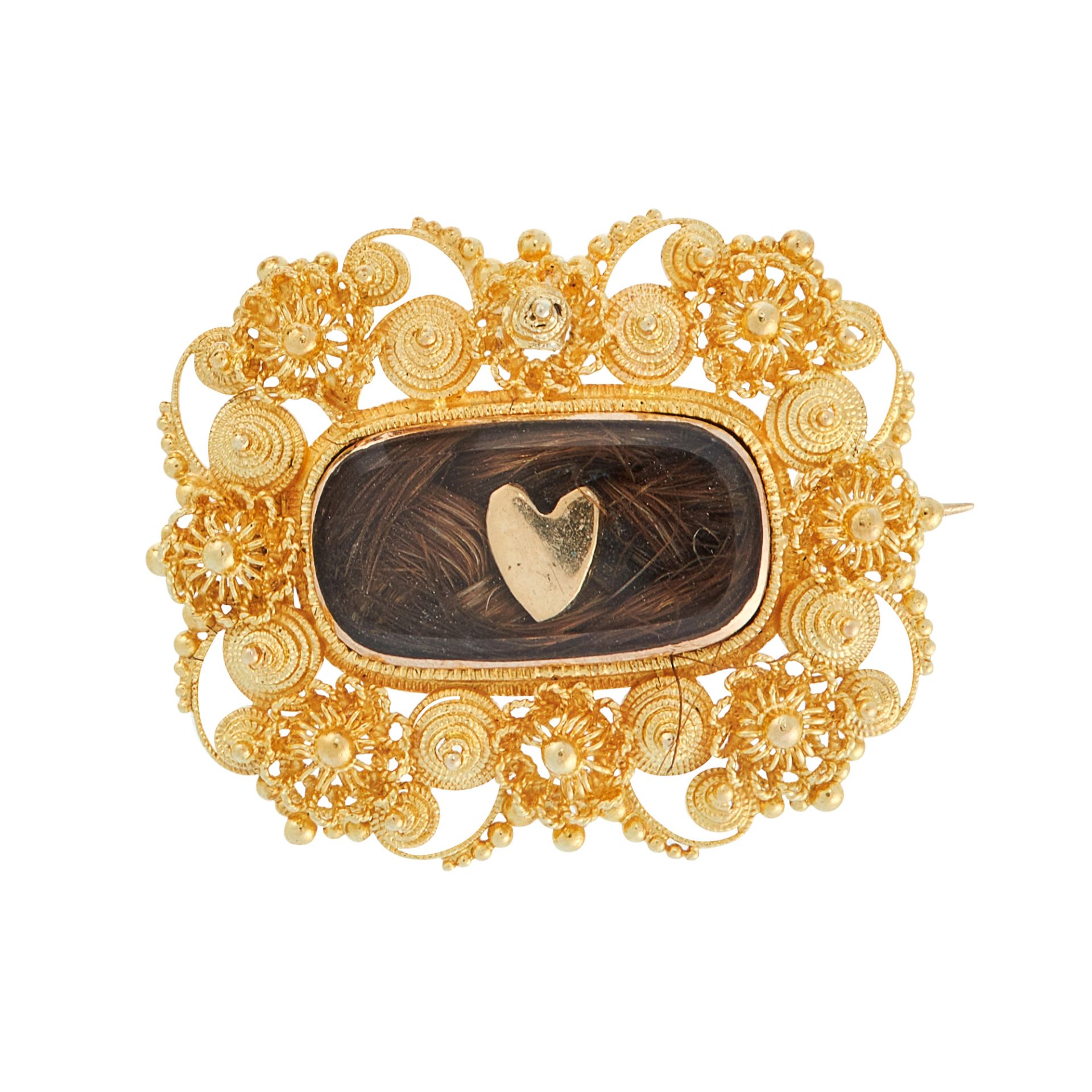 AN ANTIQUE HAIRWORK MOURNING BROOCH in high carat yellow gold, comprising of a central hairwork