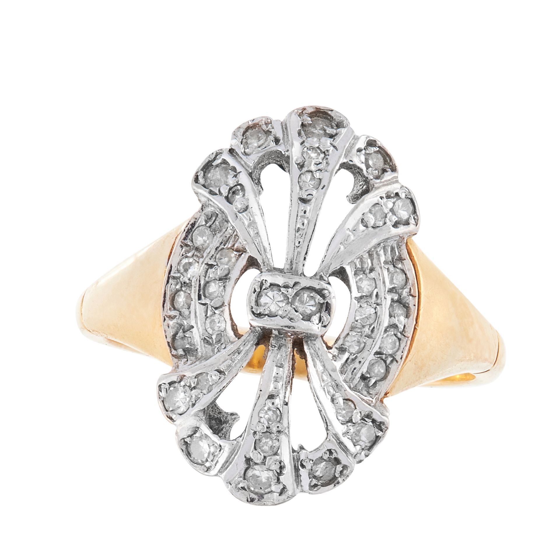 A DIAMOND DRESS RING in 18ct yellow gold, the stylised face of openwork design, set with single