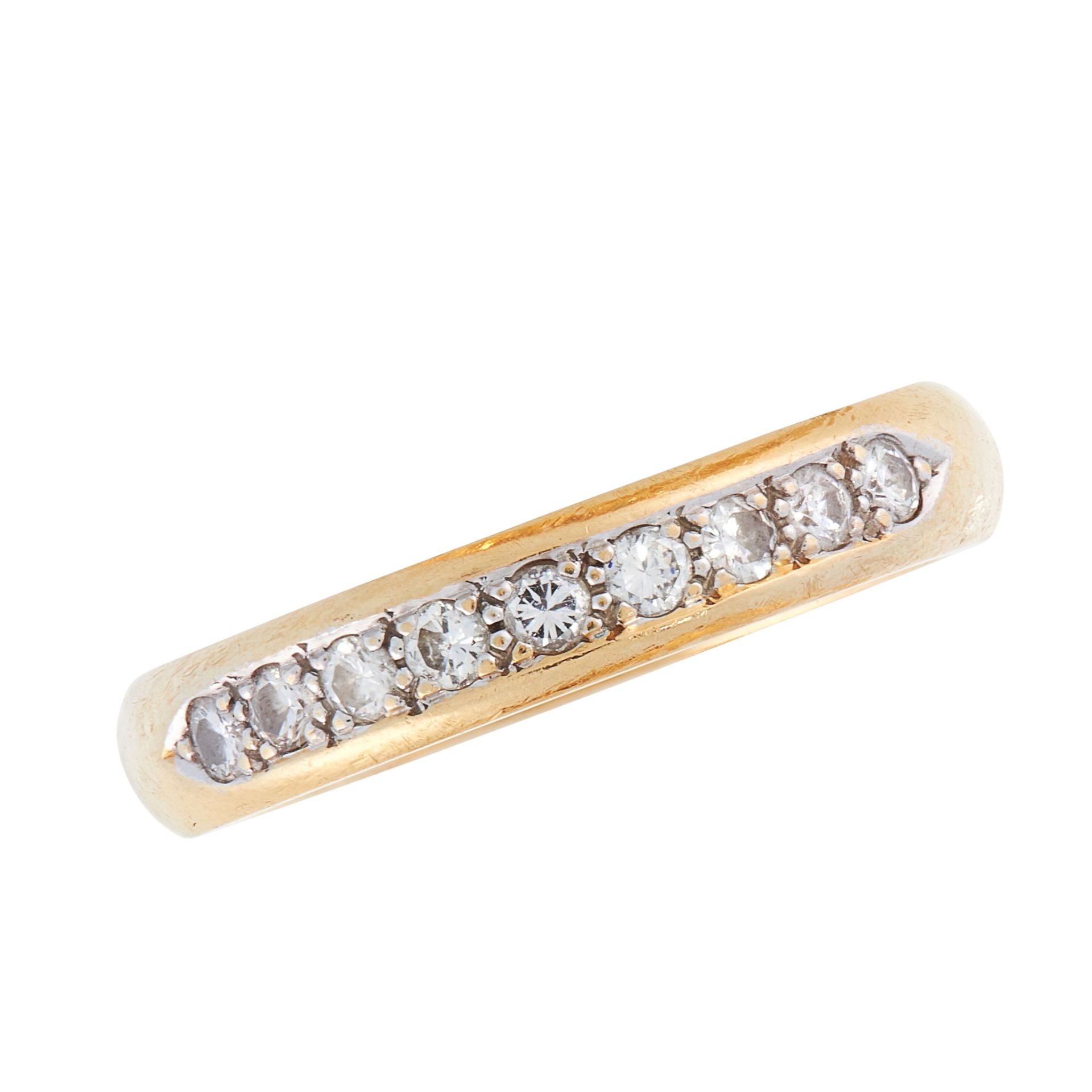 A VINTAGE DIAMOND HALF ETERNITY RING in 18ct yellow gold, the band set with nine round cut diamonds,