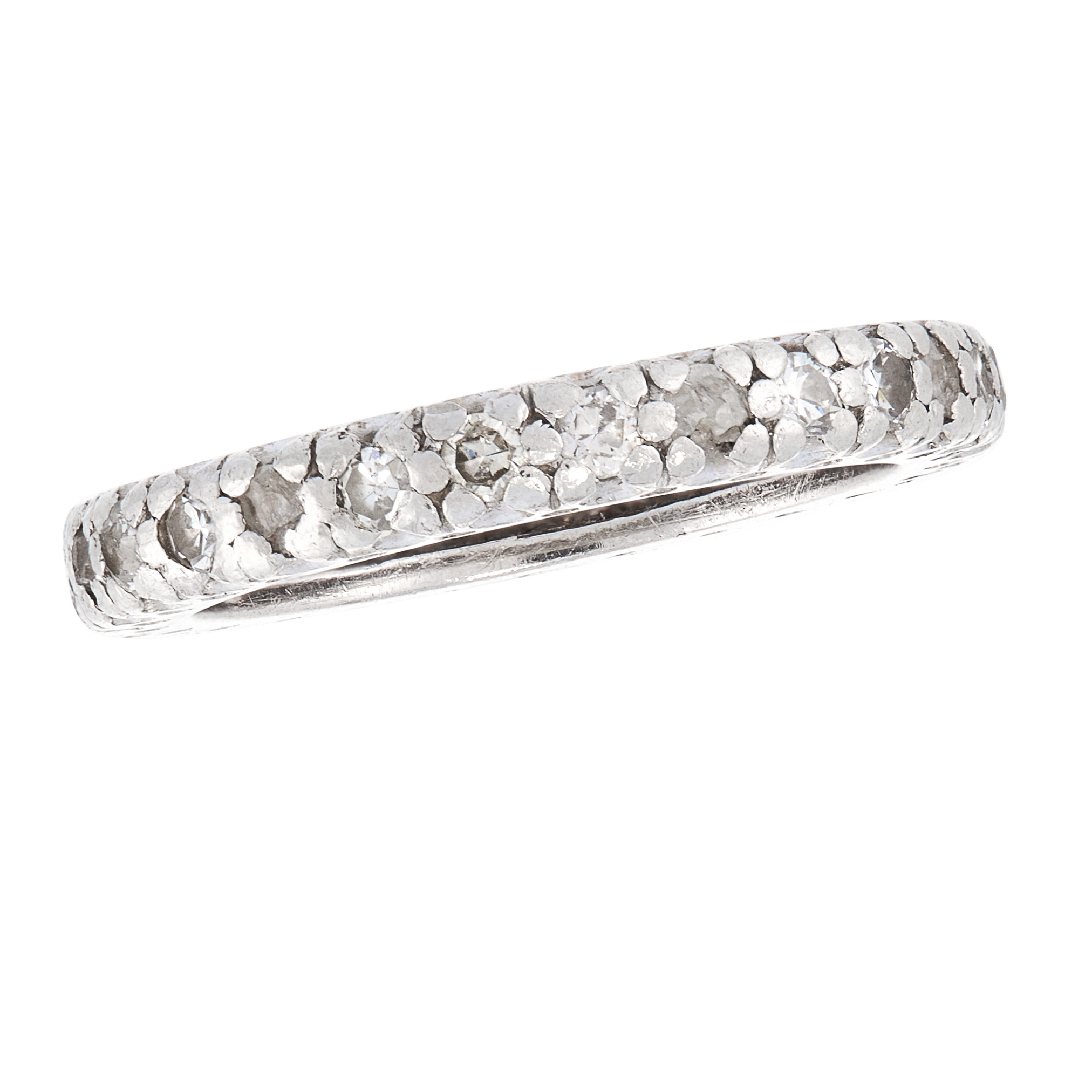 A DIAMOND ETERNITY BAND RING, CIRCA 1940 in 18ct white gold, set with a single row of single cut