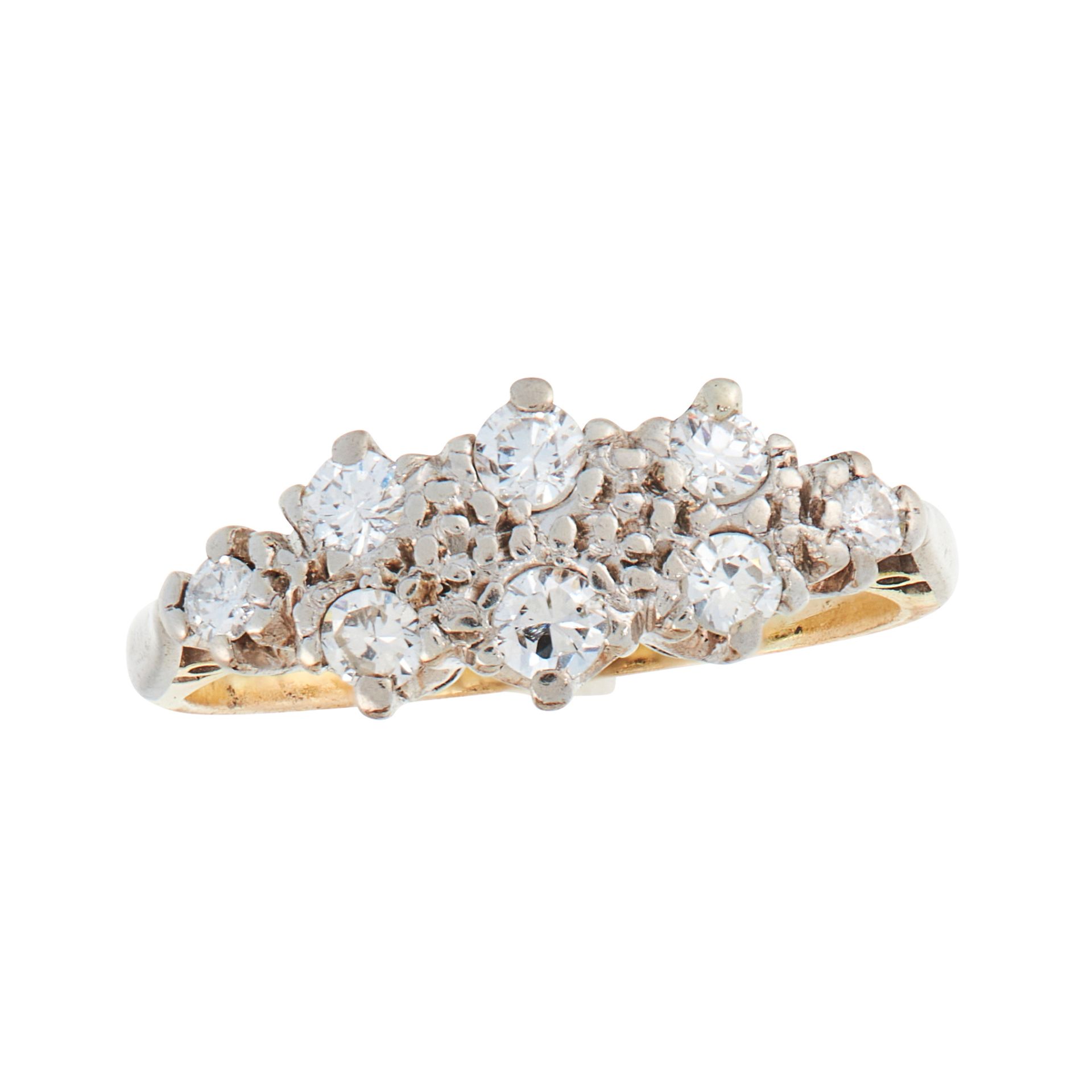 A DIAMOND DRESS RING, CIRCA 1940 in 18ct yellow gold and platinum, set with eight graduated round