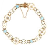 AN ANTIQUE AQUAMARINE AND DIAMOND BRACELET, CIRCA 1900 in 15ct yellow gold, set with four round