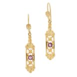 A PAIR OF AMETHYST DROP EARRINGS in yellow gold, each set with a round cut amethyst accented by