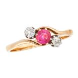 A RUBY AND DIAMOND DRESS RING, EARLY 20TH CENTURY in 18ct yellow gold, set with a round cut ruby