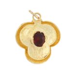 AN ANTIQUE GARNET MOURNING LOCKET PENDANT / CHARM, 19TH CENTURY in high carat yellow gold,