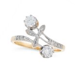 A DIAMOND DRESS RING, CIRCA 1940 in 14ct yellow gold, the twisted band terminated with flower