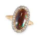 A BLACK OPAL AND DIAMOND DRESS RING in high carat yellow gold, set with an oval cabochon black