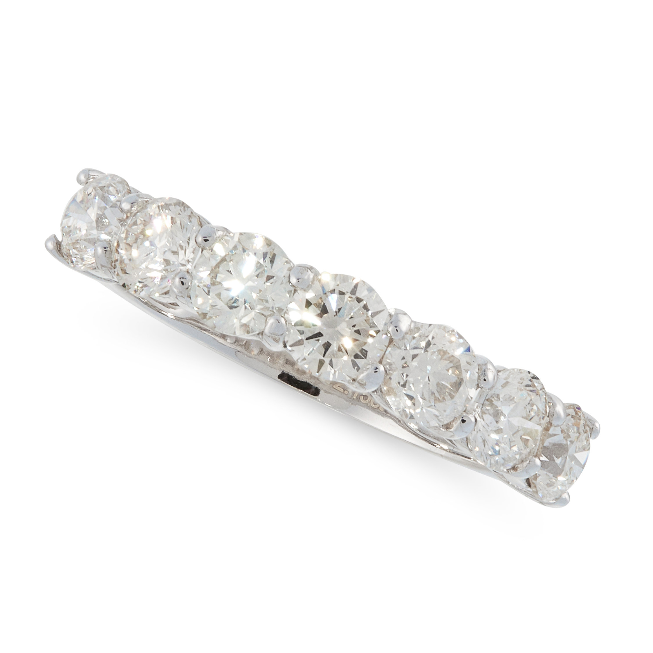 A DIAMOND ETERNITY RING in 18ct white gold, designed as a half eternity, set with a row of seven