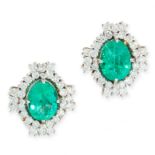 A PAIR OF EMERALD AND DIAMOND CLUSTER EARRINGS each set with an oval cut emerald of 2.39 and 2.29