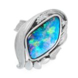 AN OPAL AND DIAMOND DRESS RING in platinum, comprising of a central cabochon opal in an abstract