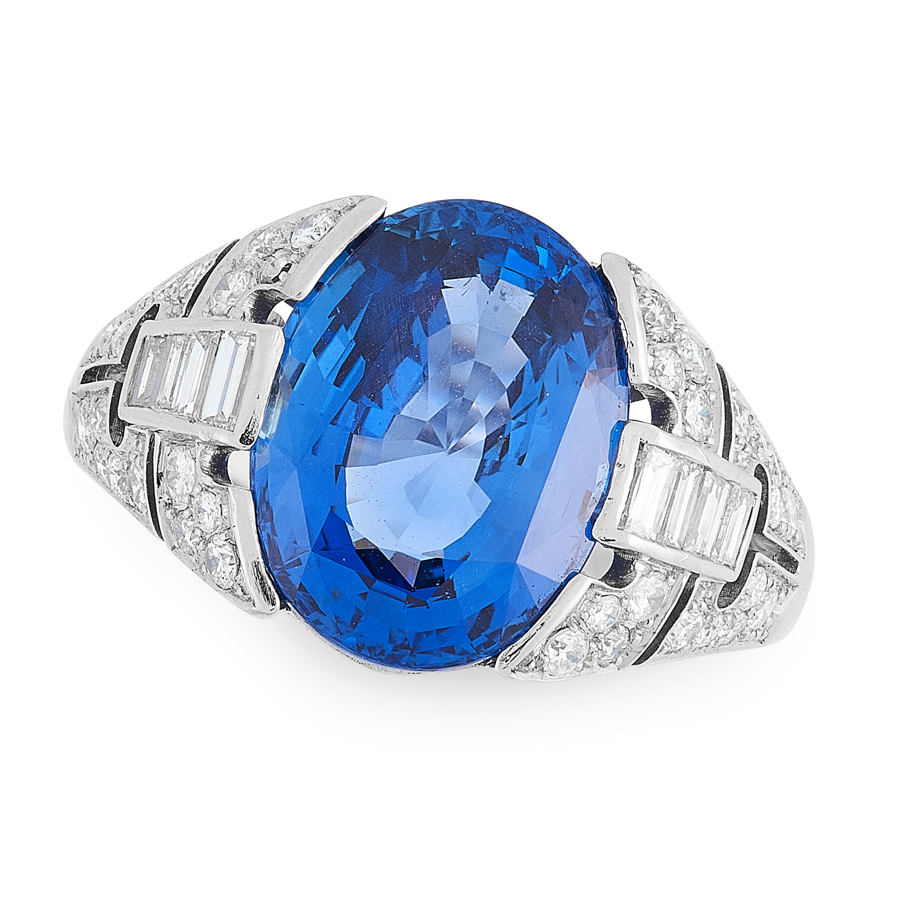 AN IMPORTANT CEYLON NO HEAT SAPPHIRE AND DIAMOND RING in platinum, set with an oval cut blue