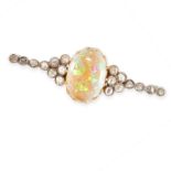 AN ANTIQUE OPAL AND DIAMOND BROOCH in yellow gold and silver, set with an oval cabochon opal of 5.68
