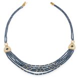 A SAPPHIRE AND DIAMOND NECKLACE in 18ct yellow gold, comprising of five rows of polished sapphire