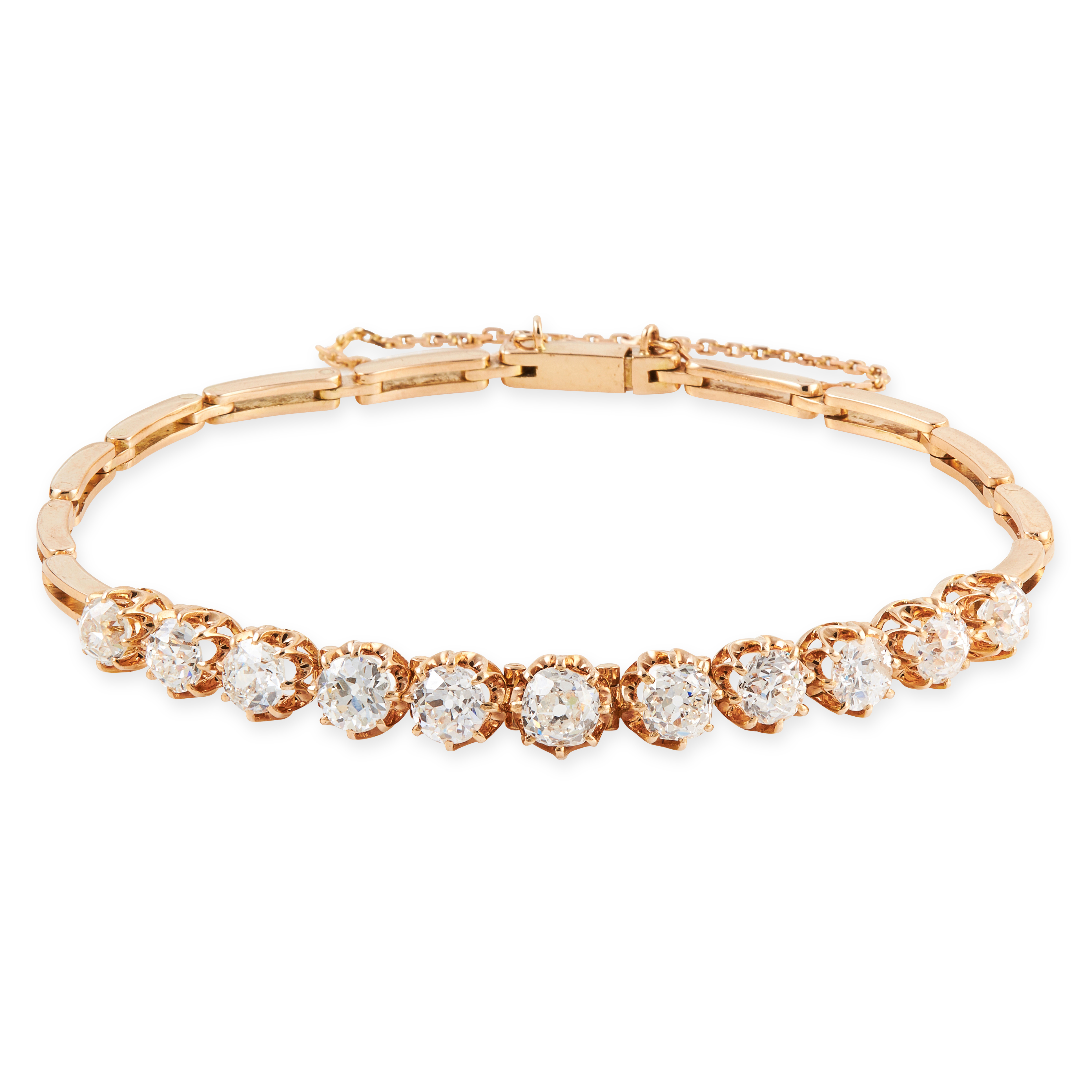 A DIAMOND BRACELET, EARLY 20TH CENTURY in high carat yellow gold, set with a row of eleven graduated