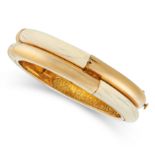 AN ANTIQUE IVORY BANGLE, TIFFANY & CO, CIRCA 1910 in 18ct yellow gold, in double band design, set