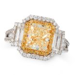 A YELLOW DIAMOND AND DIAMOND RING set with a radiant cut yellow diamond of 3.21 carats within double