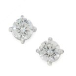 A PAIR OF DIAMOND STUD EARRINGS in 18ct white gold, set with a round cut diamond totalling 1.05