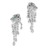 A PAIR OF DIAMOND, EMERALD AND ONYX PANTHER EARRINGS in platinum, in the form of a panthers head set