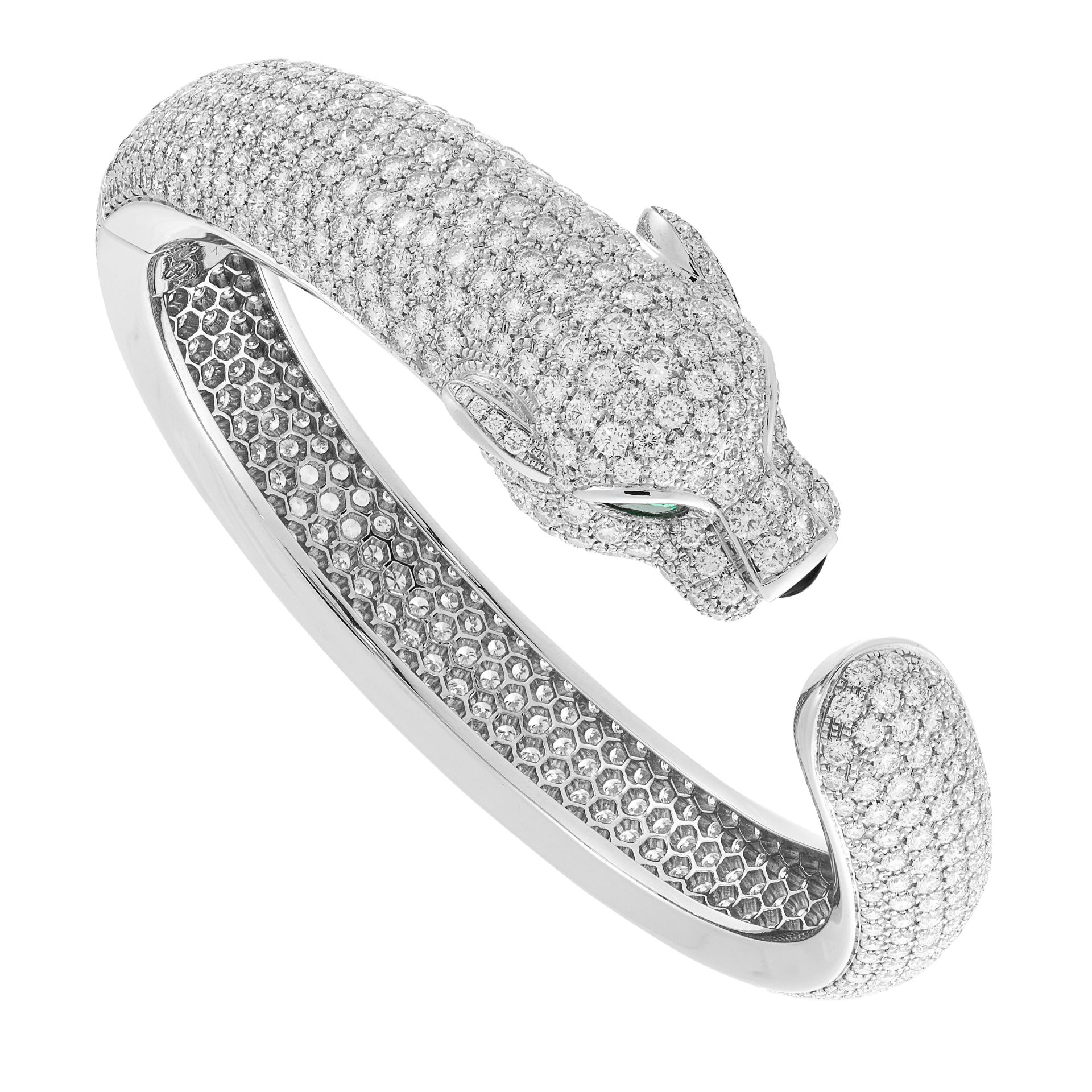 A DIAMOND AND EMERALD PANTHER BANGLE in 18ct white gold, designed as a coiling panther, set all over - Image 3 of 3