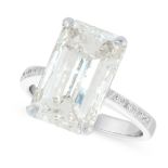 A 10.02 CARAT SOLITAIRE DIAMOND RING set with an emerald cut diamond of 10.02 carats accented by