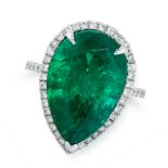 A COLOMBIAN MINOR OIL EMERALD AND DIAMOND RING in 18ct white gold, set with a pear cut emerald of