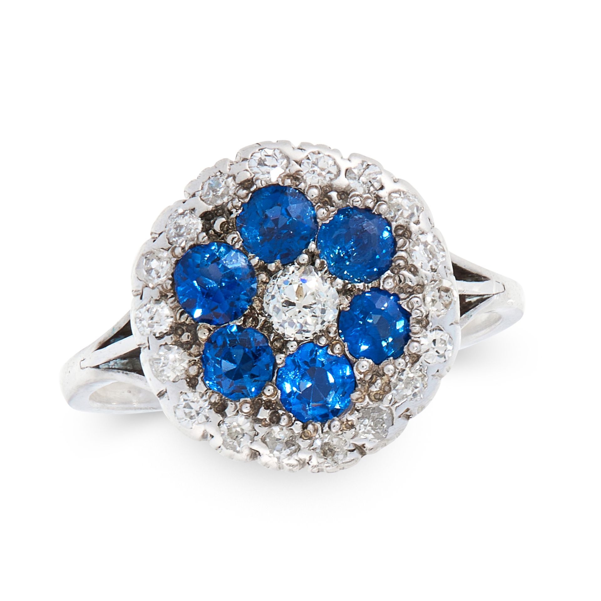 A SAPPHIRE AND DIAMOND DRESS RING, EARLY 20TH CENTURY set with an old cut diamond, within concentric