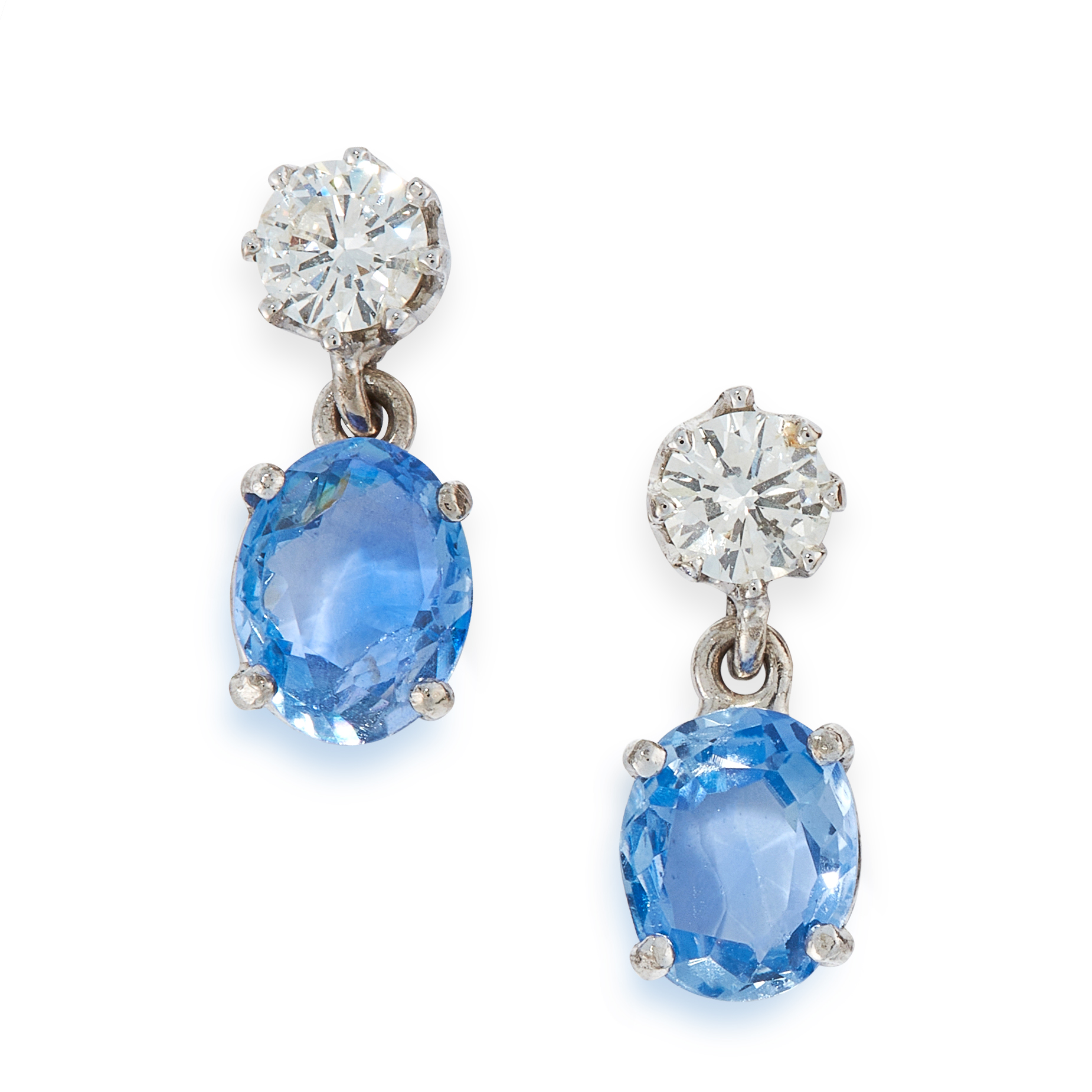 A PAIR OF SAPPHIRE AND DIAMOND EARRINGS each set with an oval cut blue sapphire of 1.35 and 1.08