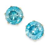 A PAIR OF BLUE ZIRCON STUD EARRINGS in 18ct yellow gold, each set with a round cut blue zircon, both