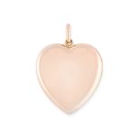 A LARGE ANTIQUE MOURNING LOCKET PENDANT, CIRCA 1900 in yellow gold, in the shape of a heart, the