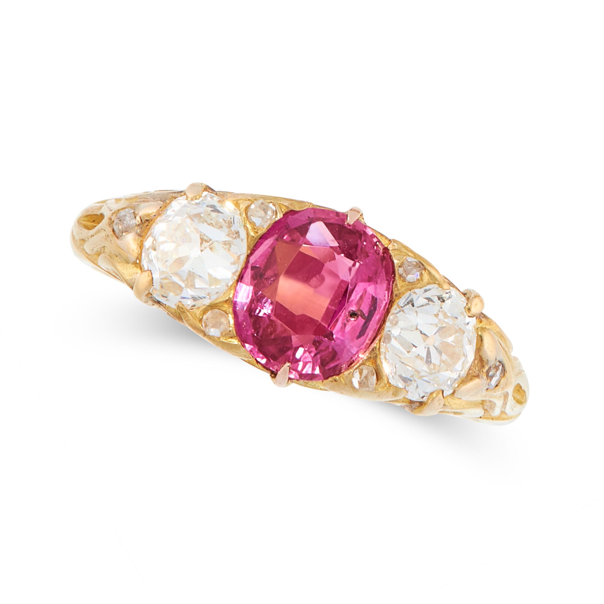 AN ANTIQUE UNHEATED RUBY AND DIAMOND DRESS RING in high carat yellow gold, set with a cushion cut