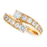 A VINTAGE DIAMOND DRESS RING in 18ct yellow gold, the twisted band half set with round cut diamonds,