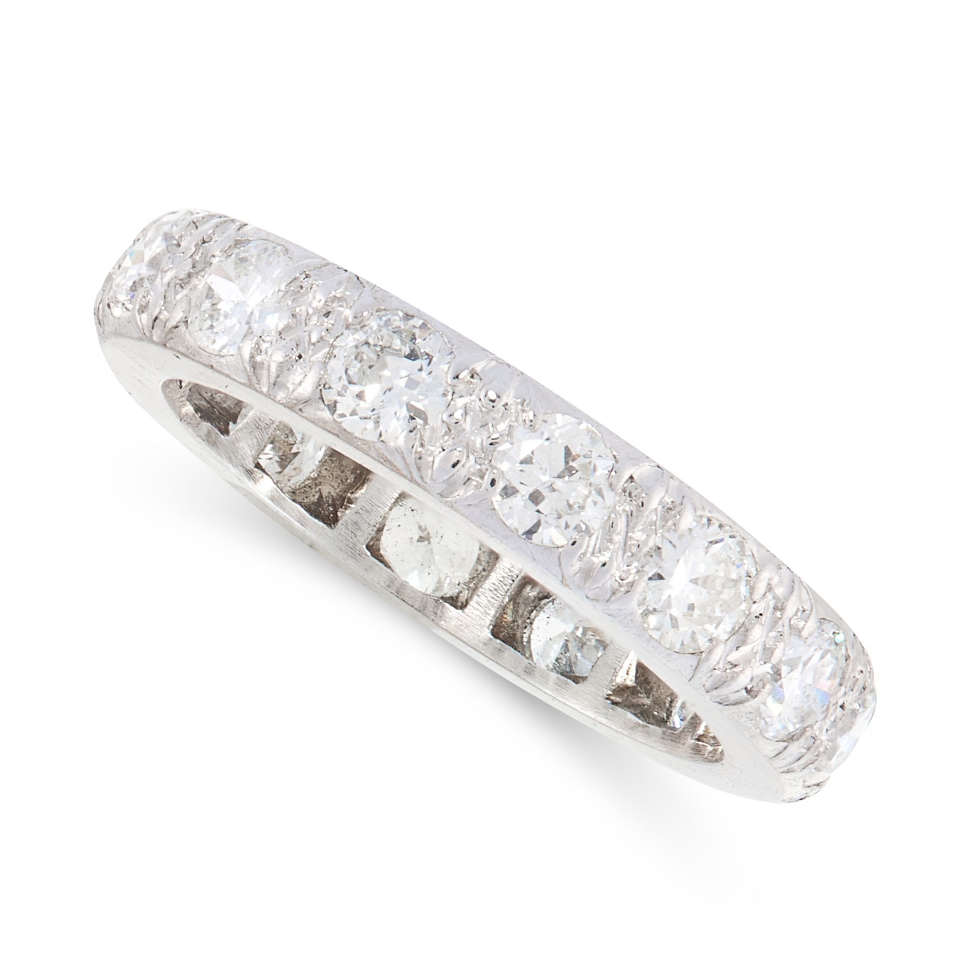 A DIAMOND ETERNITY BAND RING comprising a single row of round cut diamonds, all totalling 1.6-1.8
