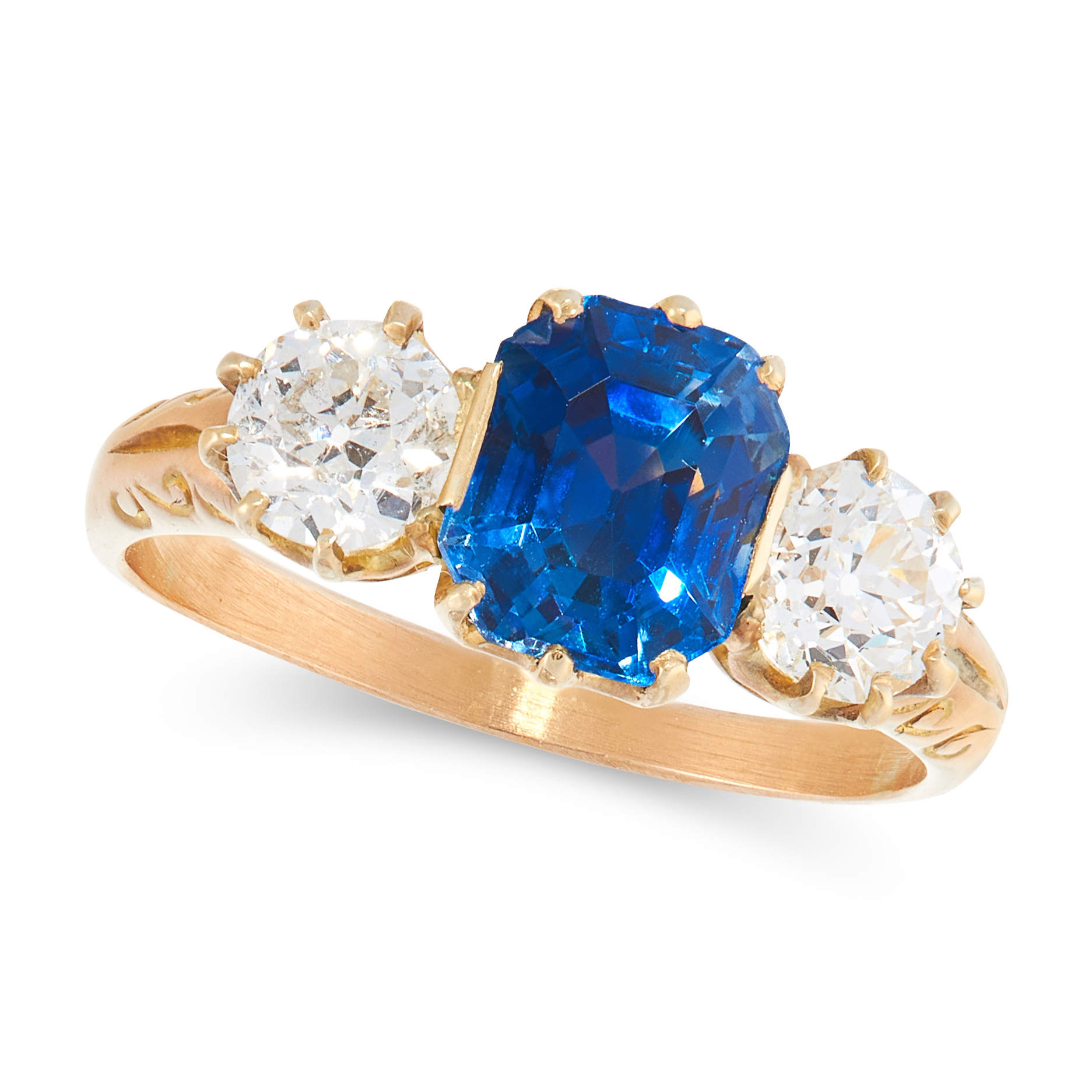 A CEYLON NO HEAT SAPPHIRE AND DIAMOND RING in high carat yellow gold, set with an emerald cut blue