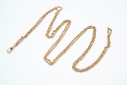 A VICTORIAN 15CT GOLD GUARD CHAIN