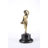 AFTER THE ANTIQUE, A DESK BRONZE OF A FEMALE NUDE WITH CYMBALS