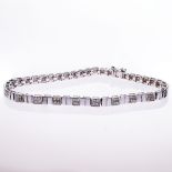 AN 18CT WHITE GOLD AND DIAMOND BRACELET