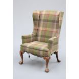 AN 18TH CENTURY WALNUT WING ARMCHAIR