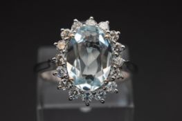 AN 18CT WHITE GOLD, AQUAMARINE AND DIAMOND RING