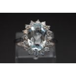 AN 18CT WHITE GOLD, AQUAMARINE AND DIAMOND RING