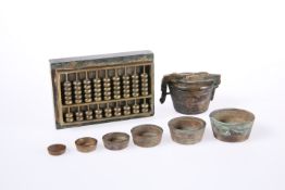 A CHINESE MINIATURE BRASS AND MARBLE ABACUS