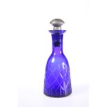 A LATE VICTORIAN CUT BLUE GLASS LIQUEUR DECANTER