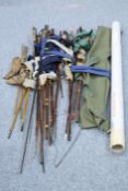 COLLECTION OF OLD FISHING RODS AND OTHER TACKLE ITEMS