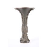 A CHINESE BRONZE VASE, in the Archaic style. 21.5cm