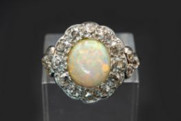 AN OPAL AND DIAMOND RING