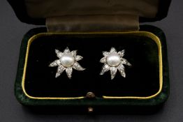 A PAIR OF CULTURED PEARL AND DIAMOND EARRINGS