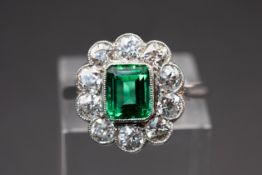 AN EMERALD AND DIAMOND RING